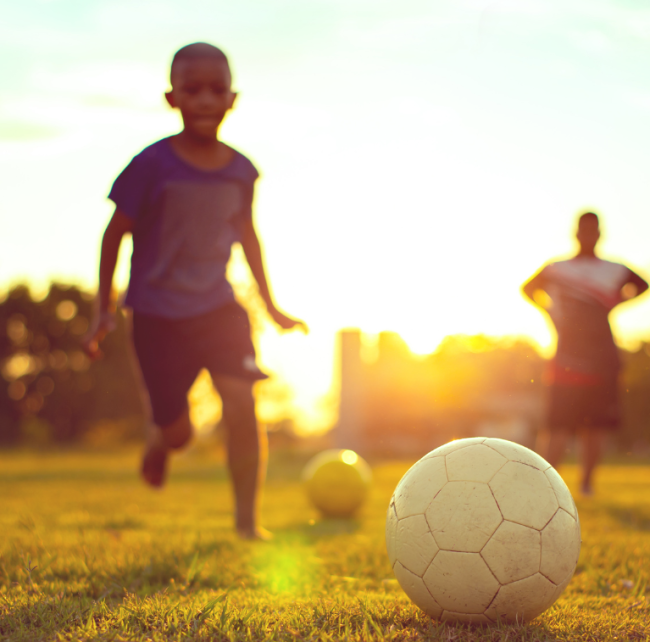 children playing soccer